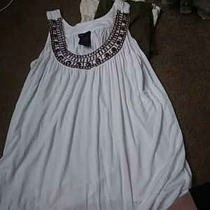 White shirt with brown beads